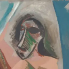 Fragment obrazu "Panny z Awinionu" Picassa. Abstrakcyjna twarz kobiety z geometrycznymi kształtami i intensywnymi kolorami.