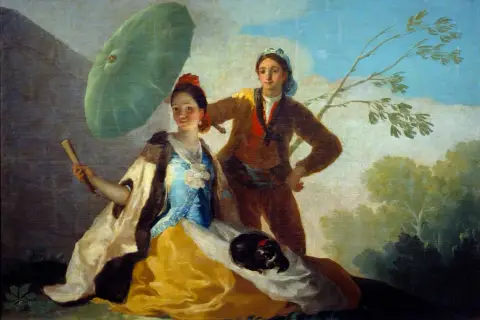 Goya namalował tę scenę: młoda kobieta z wachlarzem i parasolką, obok niej mężczyzna, a na jej kolanach piesek.