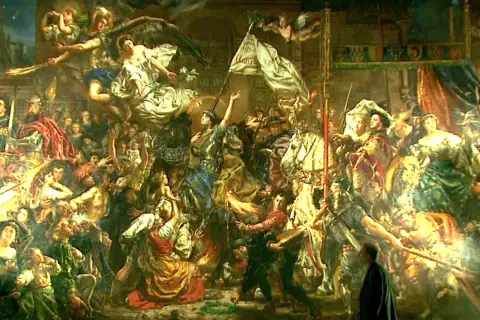 Matejko uwiecznił Dziewicę Orleańską w monumentalnym obrazie. Widać tłum ludzi, anioły i triumfalny sztandar.